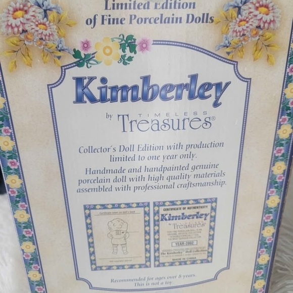 Charming Doll with Braided Hair and Floral Outfit - Picture 3 of 6